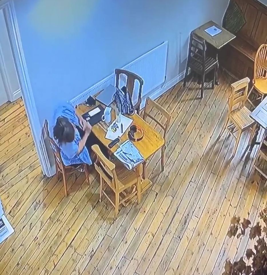 The chair in front of Hayley is tucked under the table, causing her to search for explanations