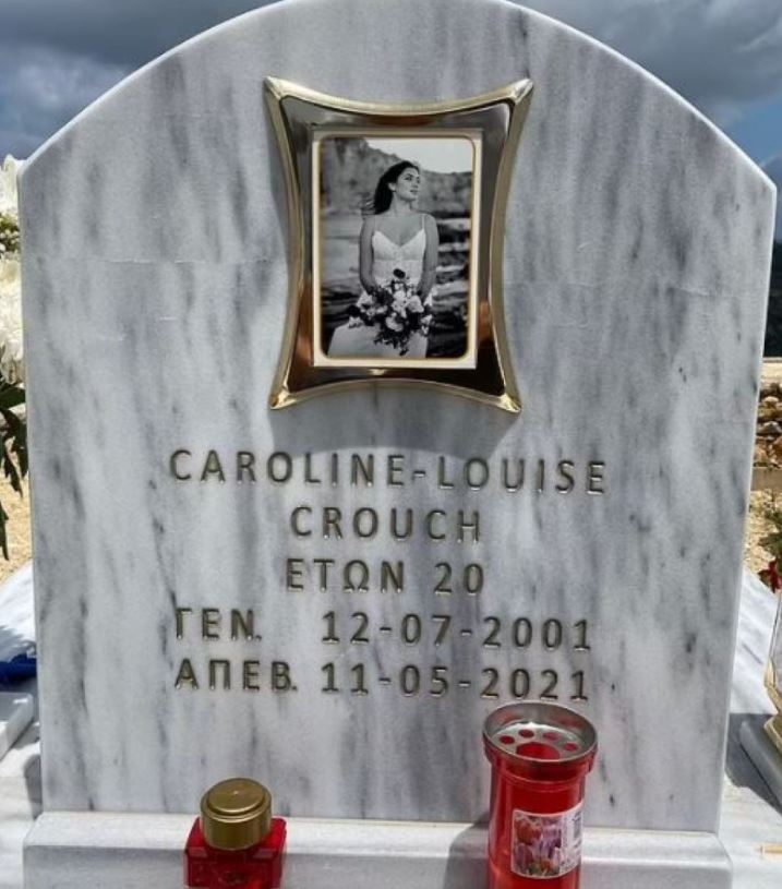 The word "wife" has been removed from the gravestone