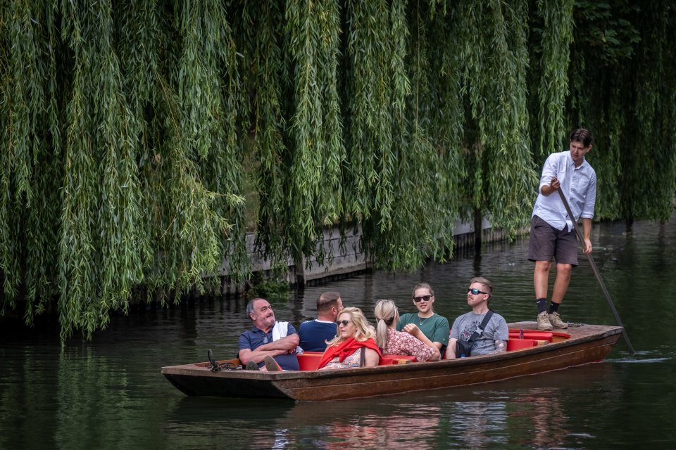 People enjoying a boat trip in Stratford-upon-Avon, Warwickshire