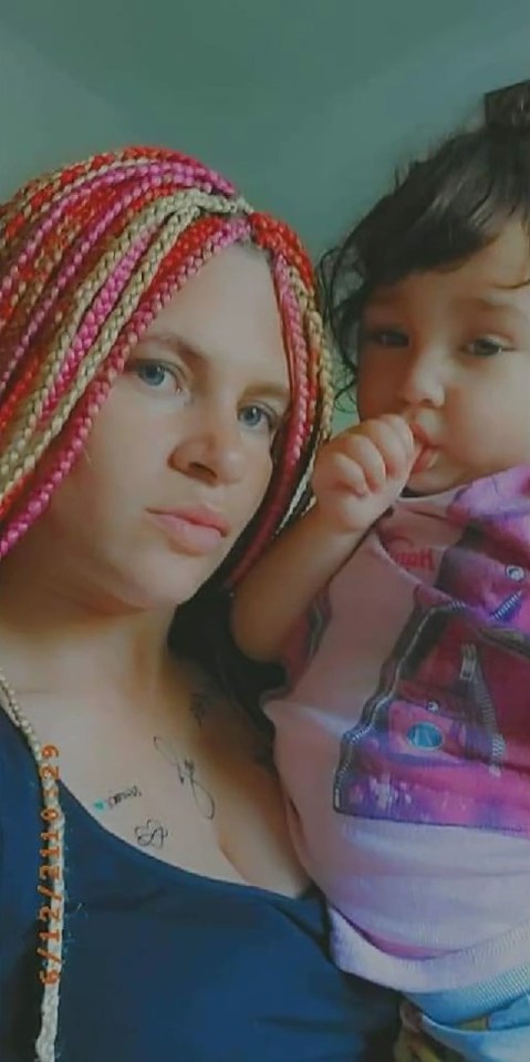 Andreea Violeta Petrice with her daughter Beatrice-Erica Petrice, who feel from the 10th floor of an apartment block