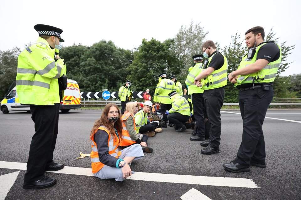 Demonstrators from Insulate Britain blockade the M25 at junction 23 for the A1