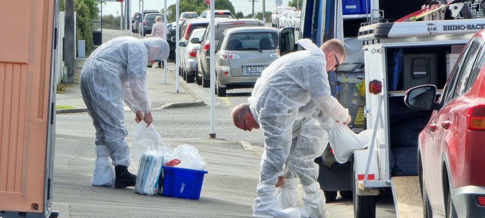 Police forensics officers at the scene in Timaru, New Zealand