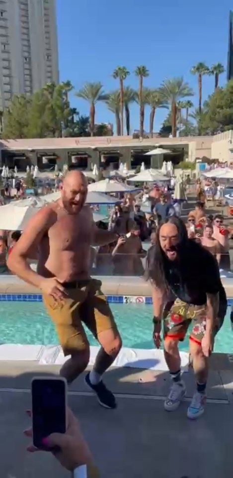 Tyson Fury partying with DJ Steve Aoki at a Vegas pool