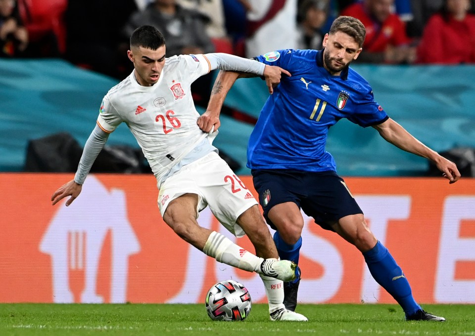 Pedri of Spain with Italy's Domenico Berardi at Euro 2020