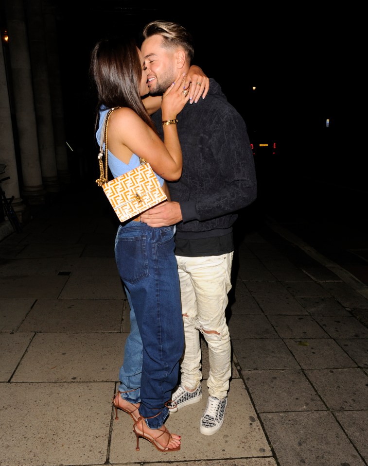 Chris Hughes and Annabel Dimmock packed on the PDA for a romantic date night