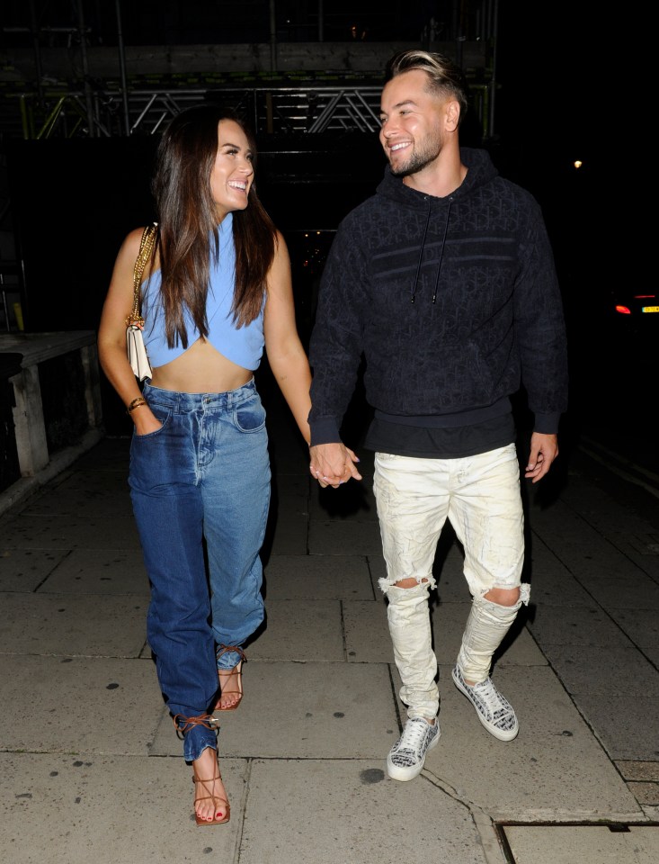 The couple stared adoringly at one another as they strolled through London