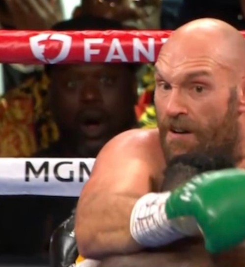 Shaquille O'Neal's jaw drops as he watches the fight