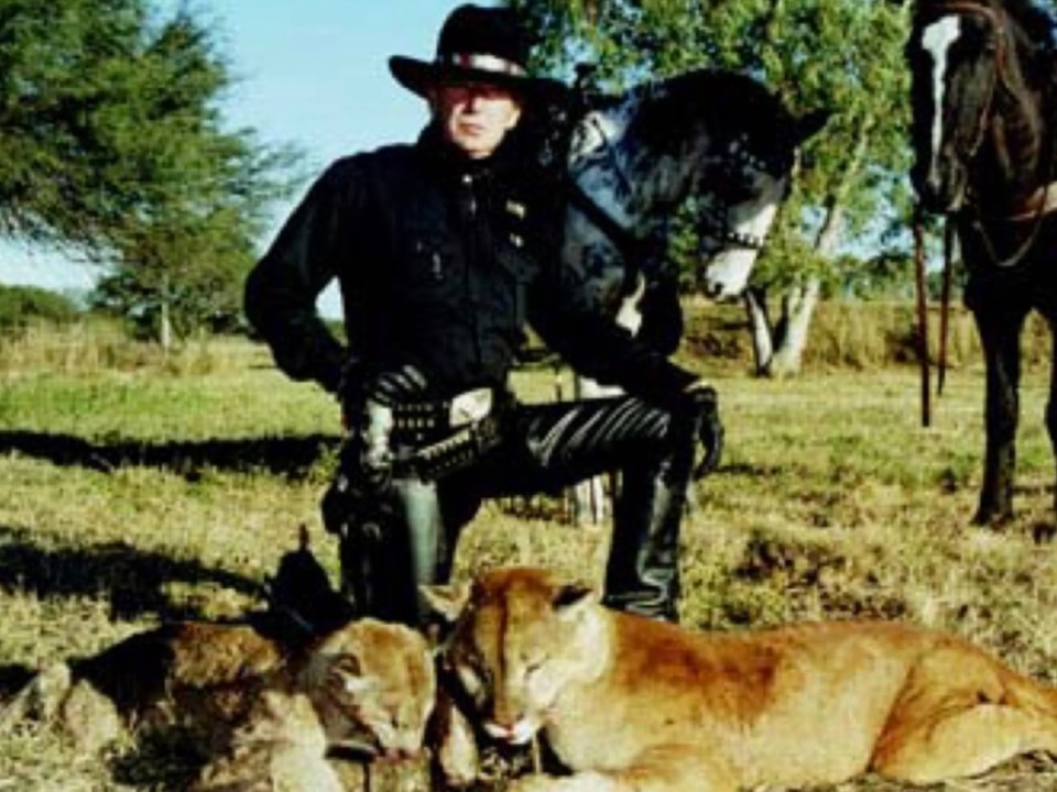 Steve Chancellor with a puma he killed with a handgun in Argentina back in 2000