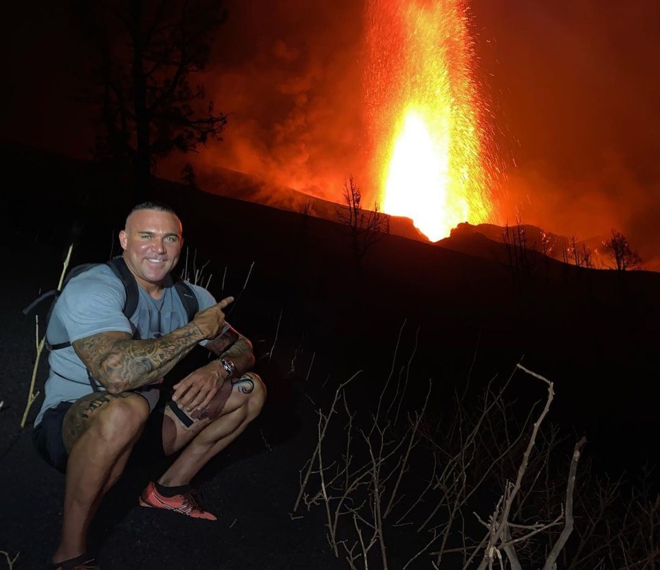 The men snuck around police barriers and hiked five hours to get to the volcano top
