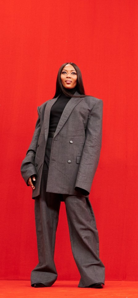 Naomi Campbell in trendy oversized clothes at the Balenciaga show