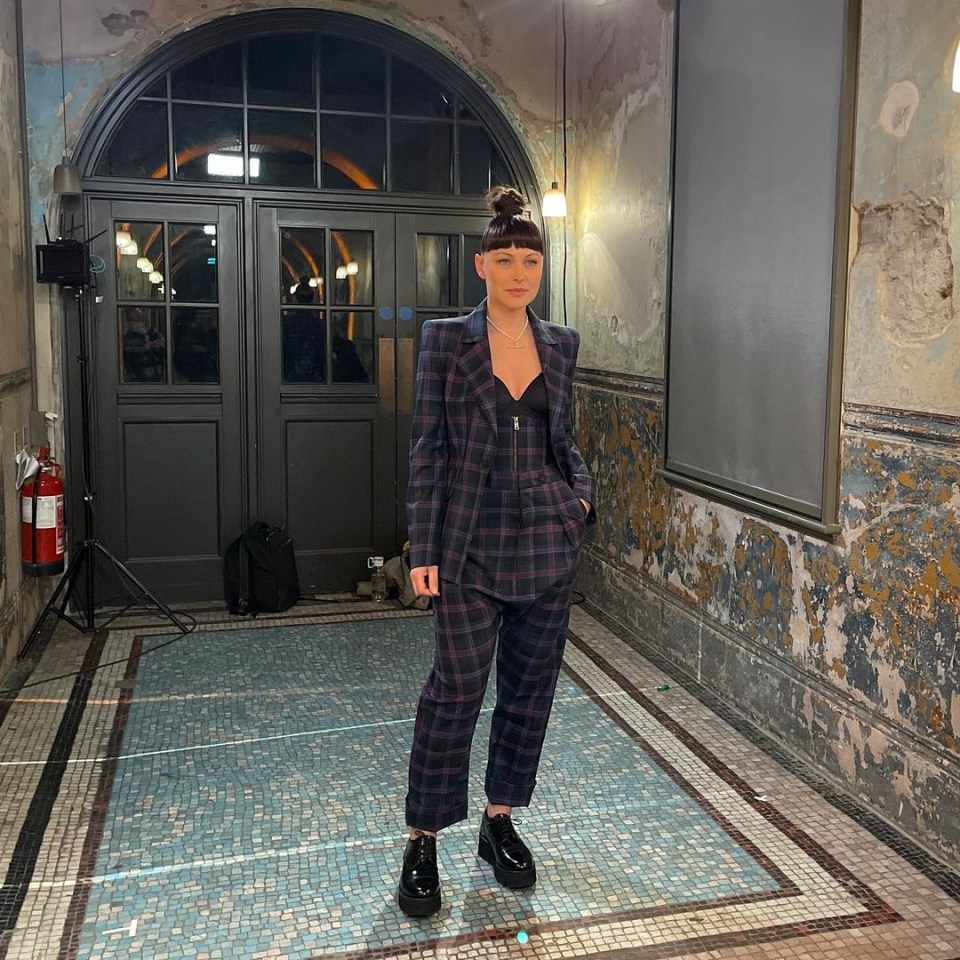 Emma looked the epitome of style in her three-piece suit