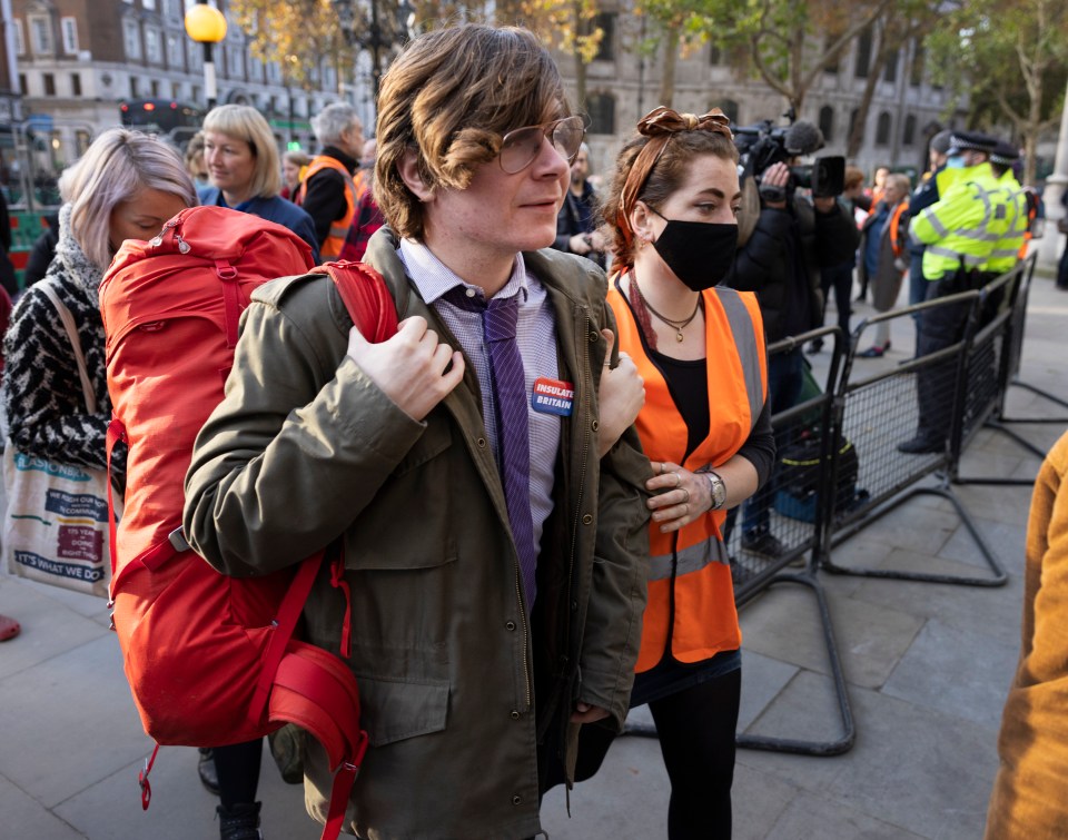 Insulate Britain activist Louis McKechnie walks into The High Court for sentencing