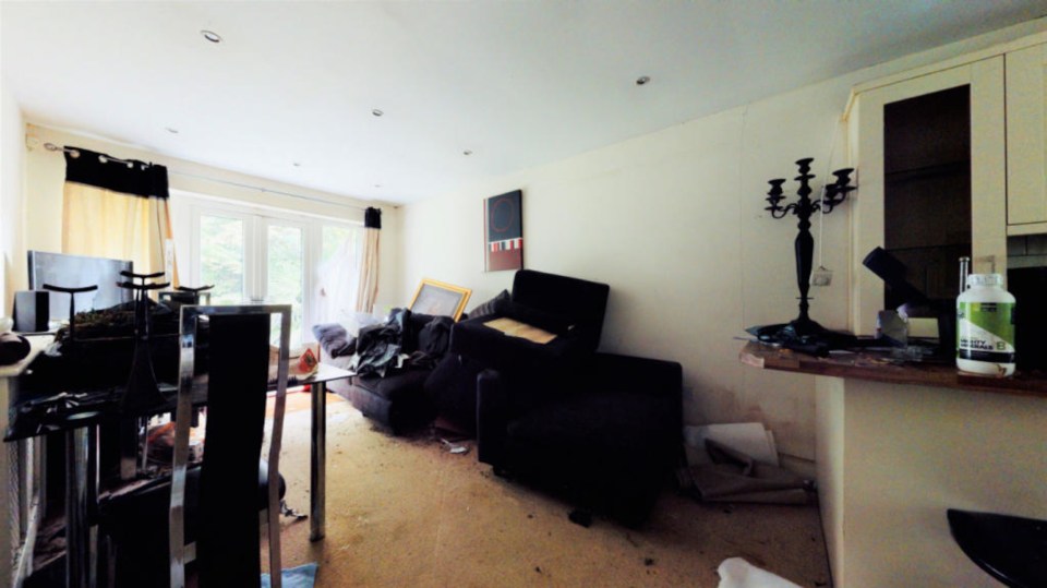 Even the living room is littered with junk