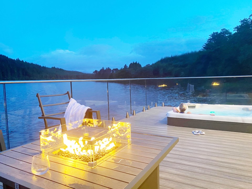 It also boasts a waterside hot tub and wrap-around deck
