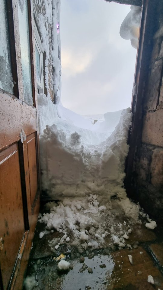 Around 5ft of snow has trapped the group in the pub
