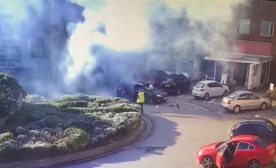 Dave can be seen emerging from the shattered car
