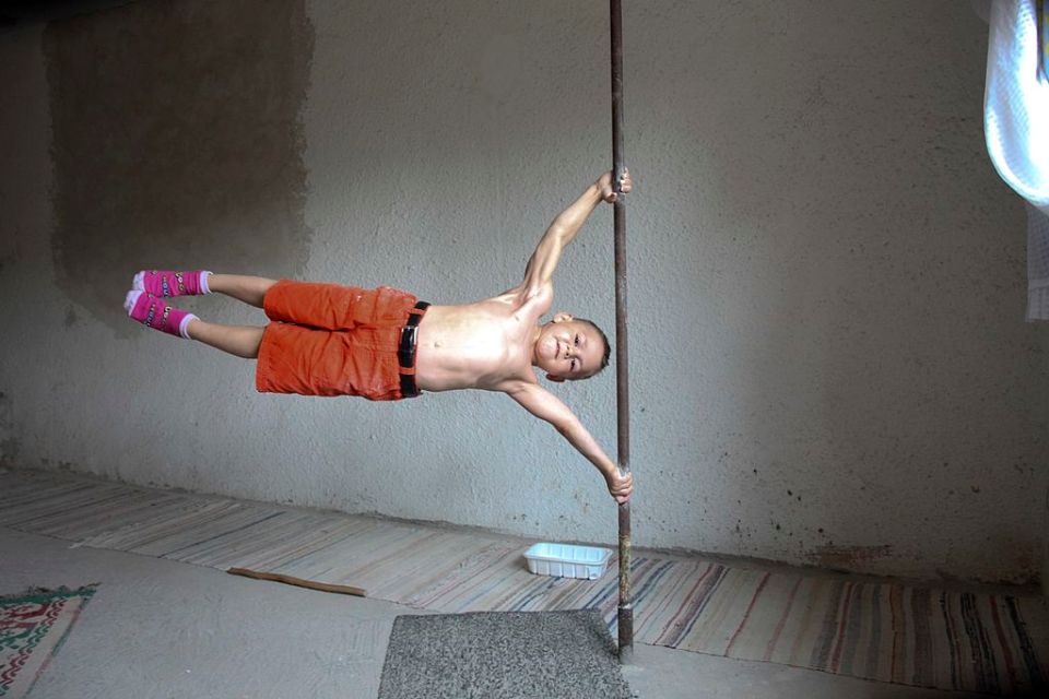 Giuliano performing the flag pose