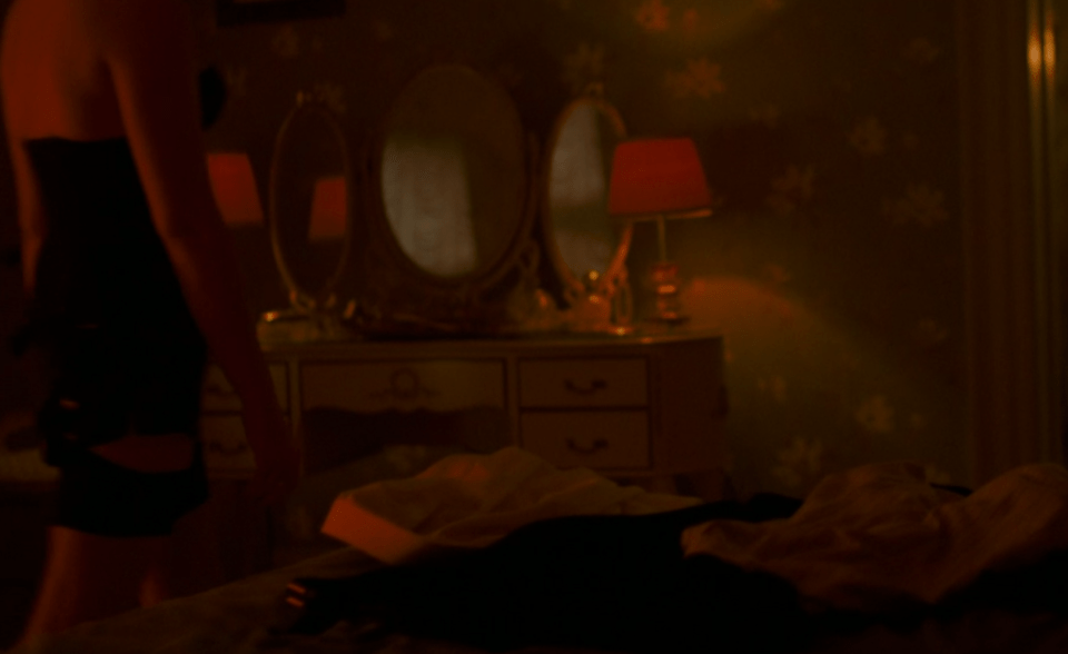 Claire Foy takes off her dress
