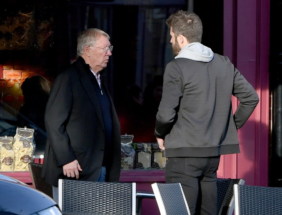 And Carrick went for a more casual look with a jacket, hoodie and trainers