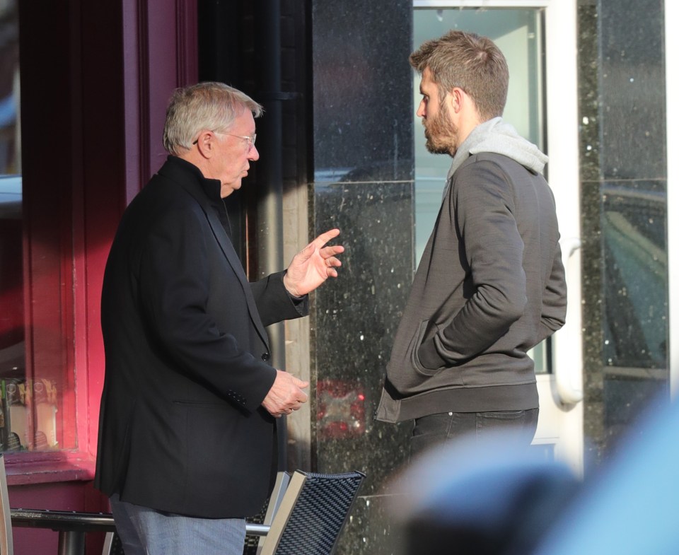 Fergie was dressed in a black jacket and smart trousers