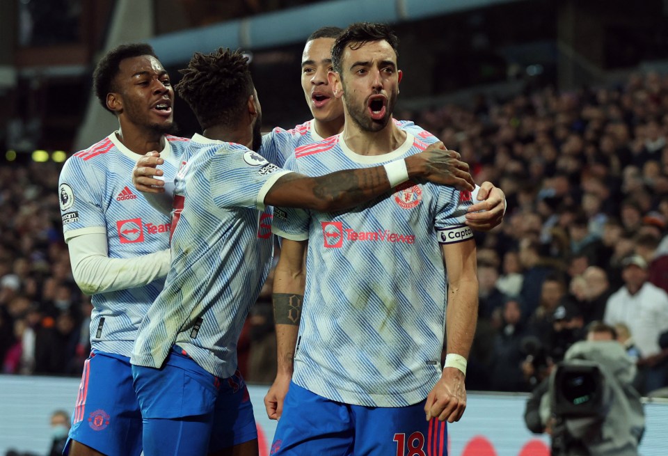 Portuguese star Fernandes was mobbed by his team-mates after grabbing his second of the match