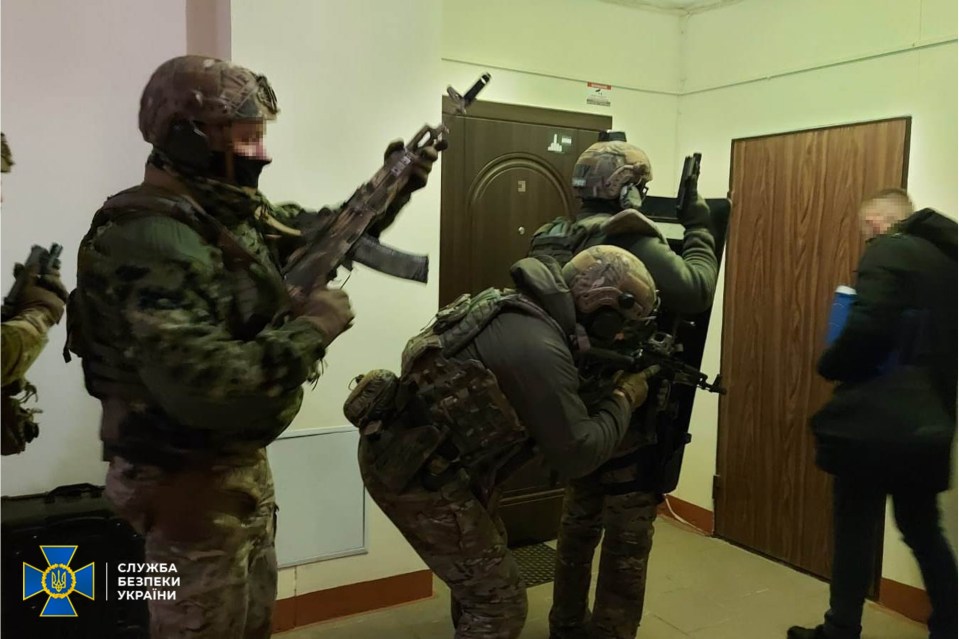Pictures released by Ukraine of the raid on the 'gang' who were being coordinated by Russia