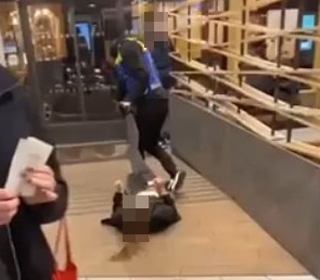 A woman has been arrested on suspicion of assault in connection with the incident