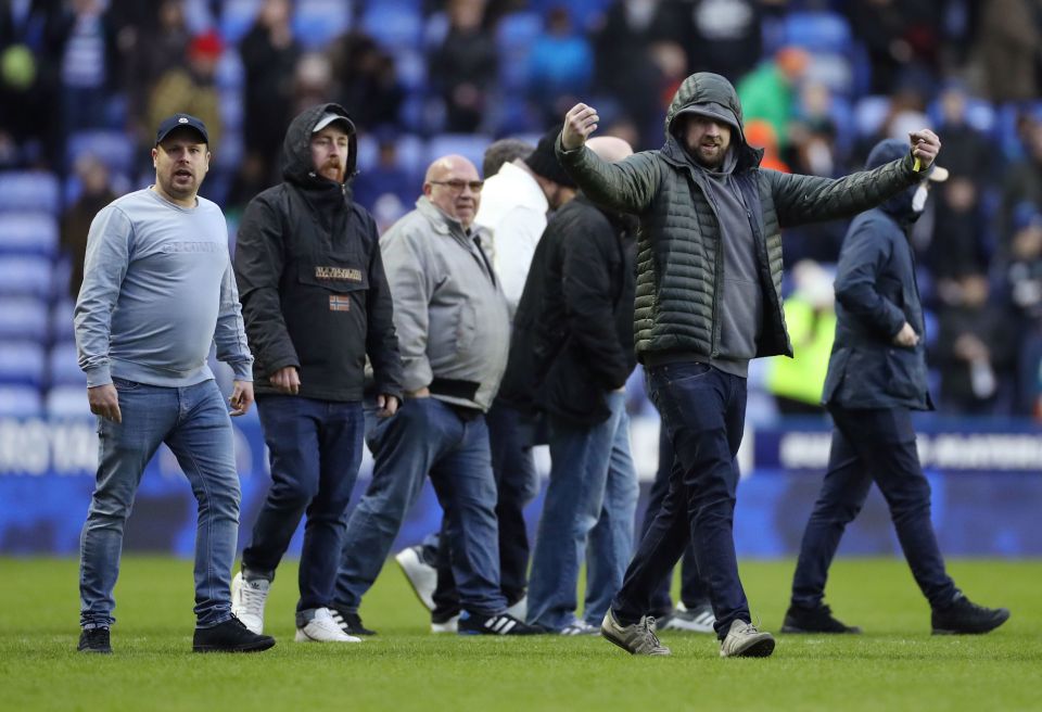 A group of Reading fans stormed the pitch following their home defeat to Coventry