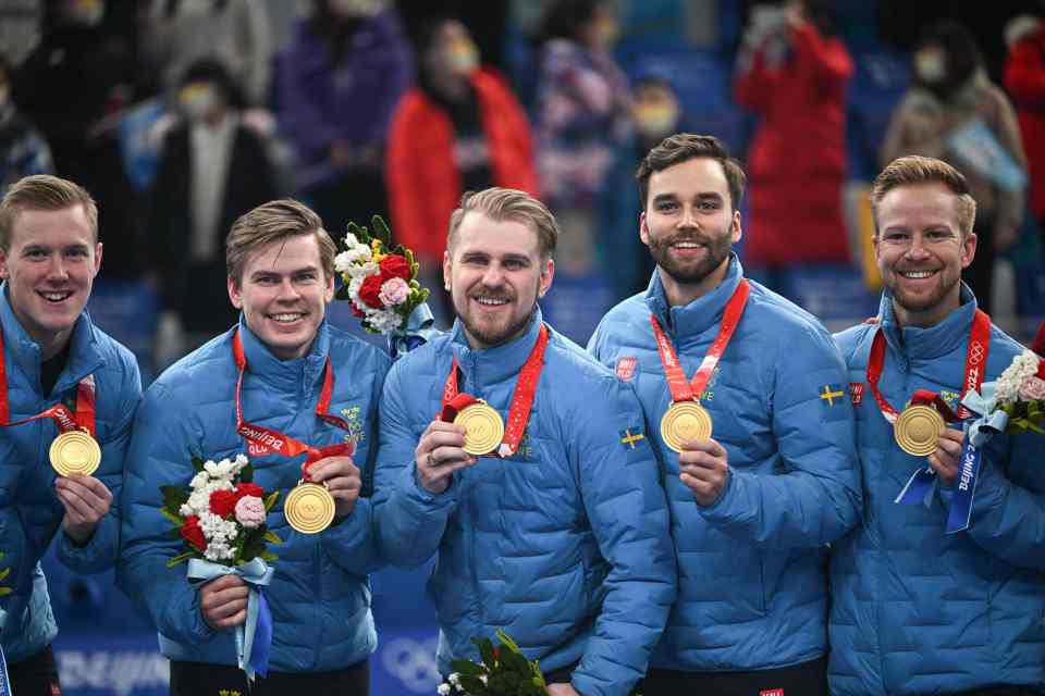 The victorious Swedes clutch their gold medals