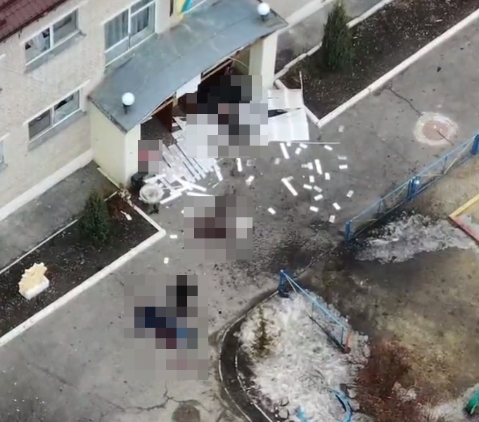 Horror photos showed at least two bodies lying outside a nursery in Okhtyrka