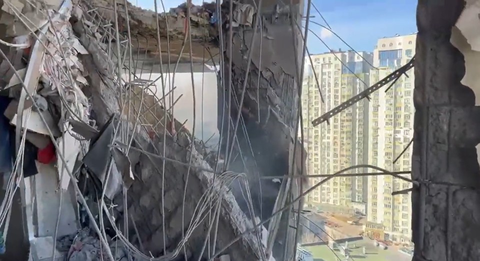 A destroyed apartment block after bombing earlier today