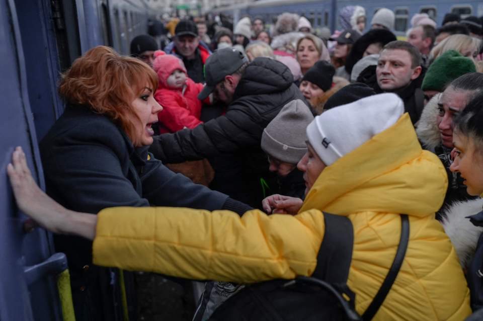 In Odessa, people try desperately to board trains