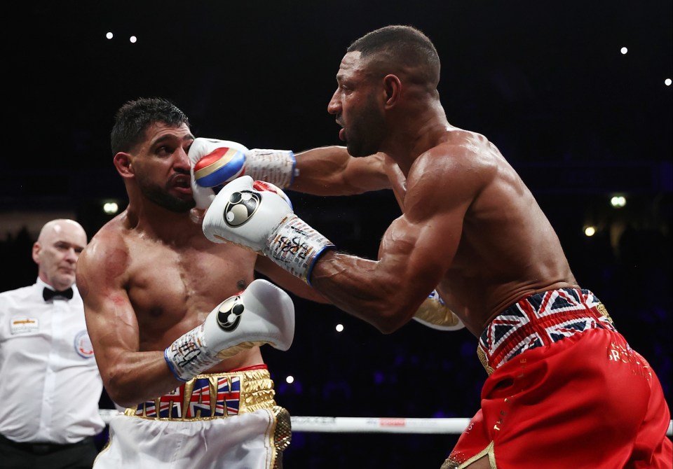 Amir Khan's face is distorted by Kell Brook's brutal power