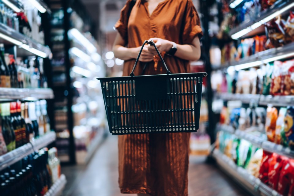 The worker 'followed' the husband and his wife around the supermarket
