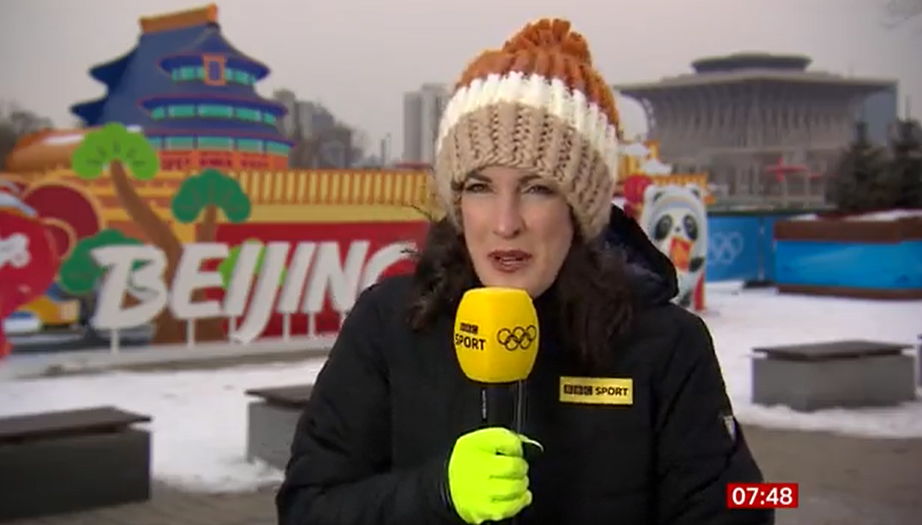 Katherine presented live from the Winter Olympics in Beijing wearing a striped bobble hat
