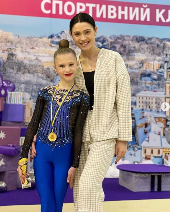 Kateryna Dyachenko, 10, and her coach Anastasia Meshchanenkova