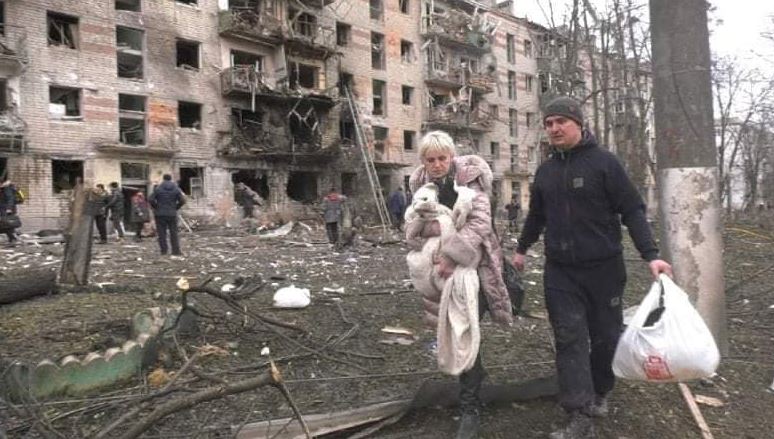 Ukrainian emergency services releases pictures of people leaving their ruined homes