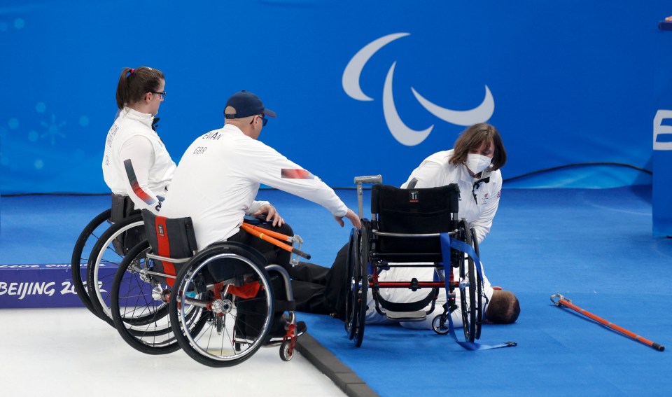 British curler David Melrose fell from his wheelchair during Wednesday's match