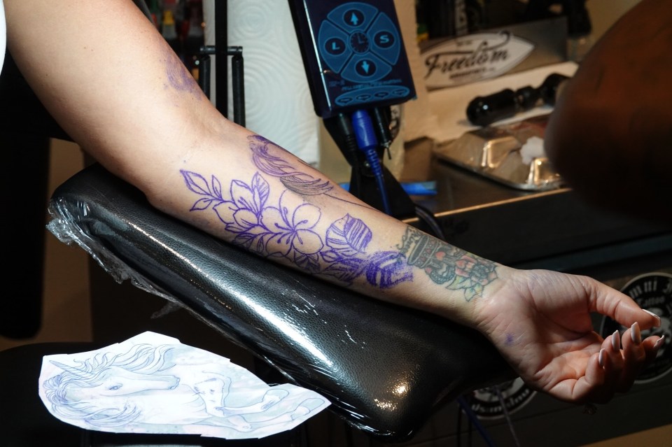 The tattoo was shown being drawn below a crown on her wrist