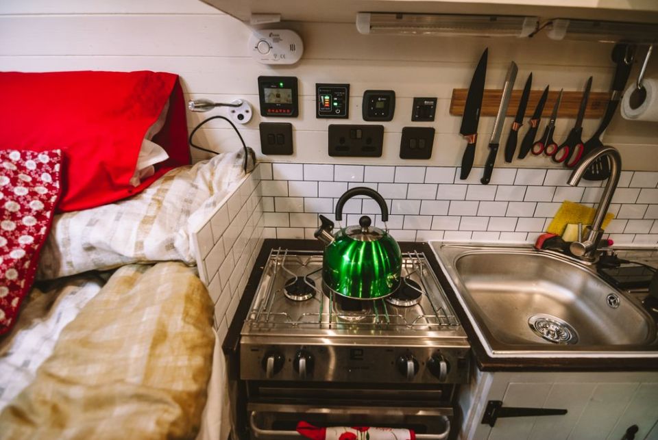The van has it's own little kitchen with an oven, hob, sink and cupboards