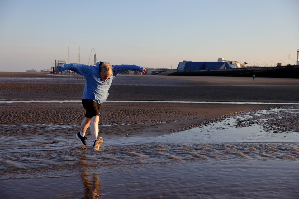 The PM had his official photographer snap him as he ran, in the loosest sense of the word, along Blackpool beach