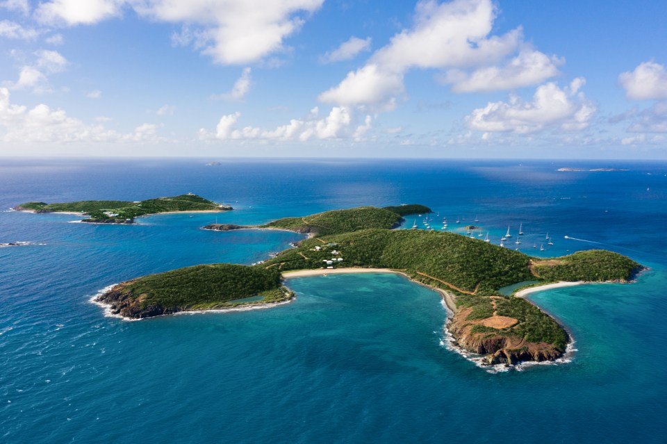 The sprawling island is surrounded by blue tropical water