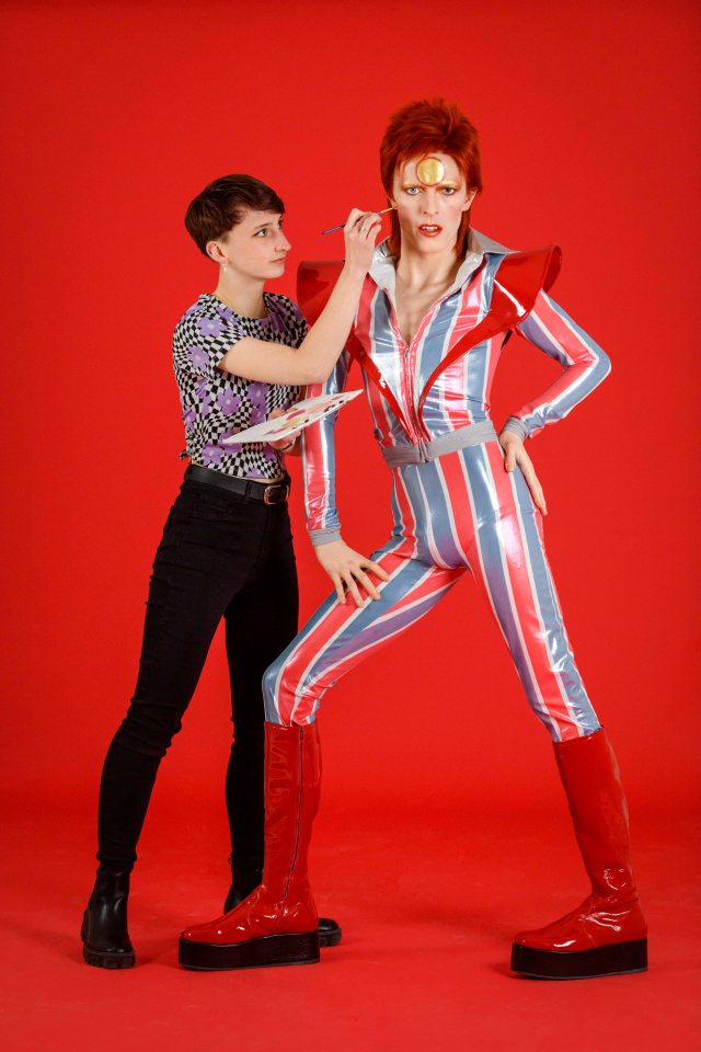 Bowie is seen in his iconic red, white and blue Ziggy Stardust spacesuit