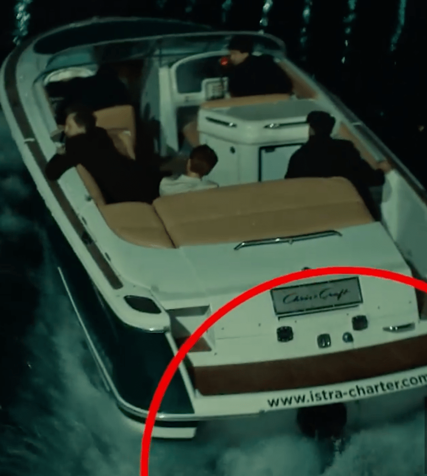 The classic style speedboat had an internet address on its stern