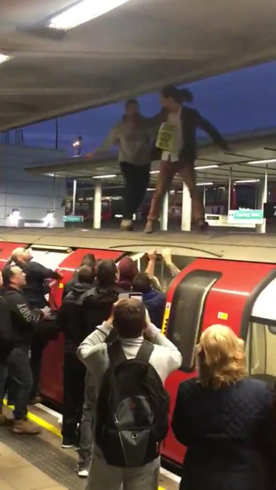 An eco activist who enraged commuters by climbing on top of a Tube train admitted yesterday: 'We got it wrong'