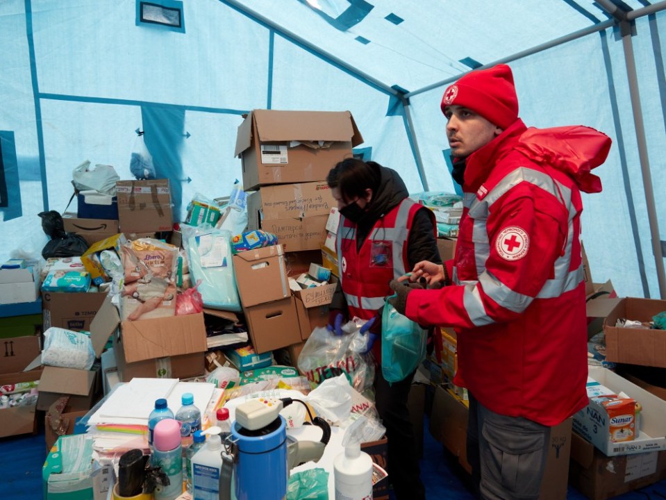 Volunteers from across the globe are ­pitching in to help the Red Cross