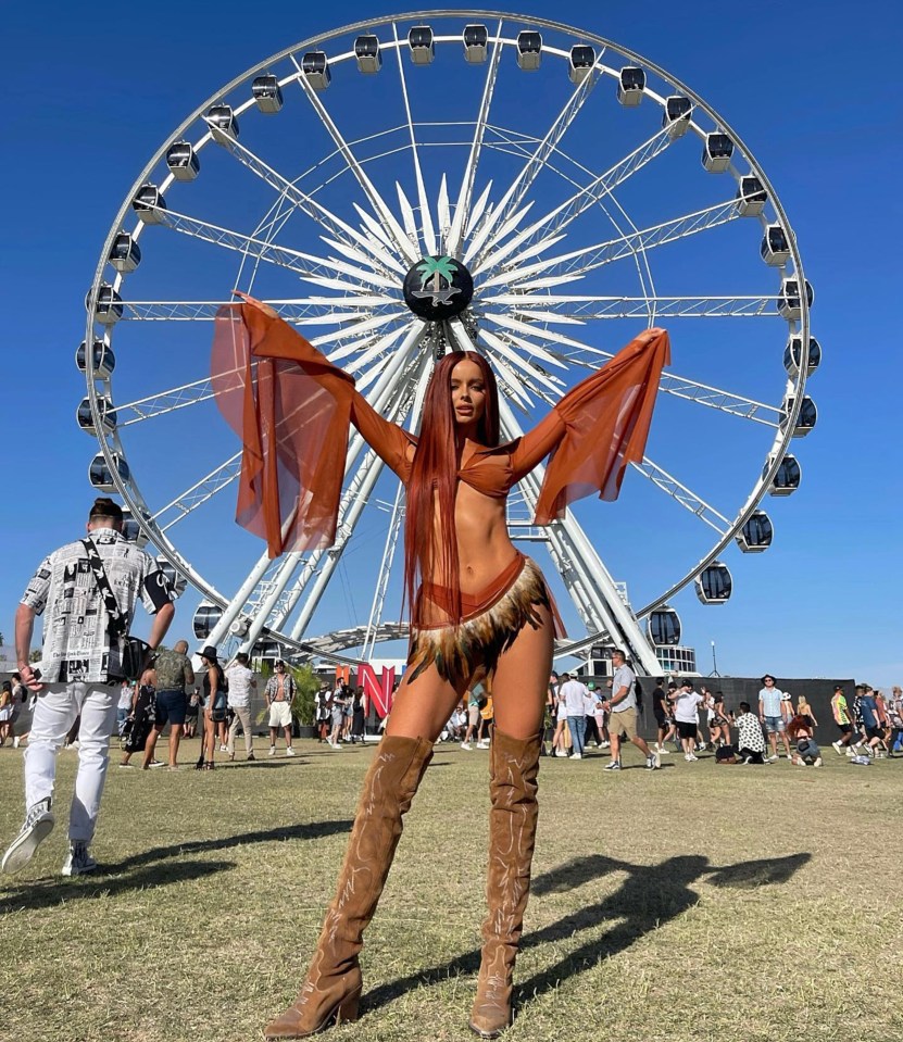 The star rocked a feather skirt over a bikini bottom and matching top