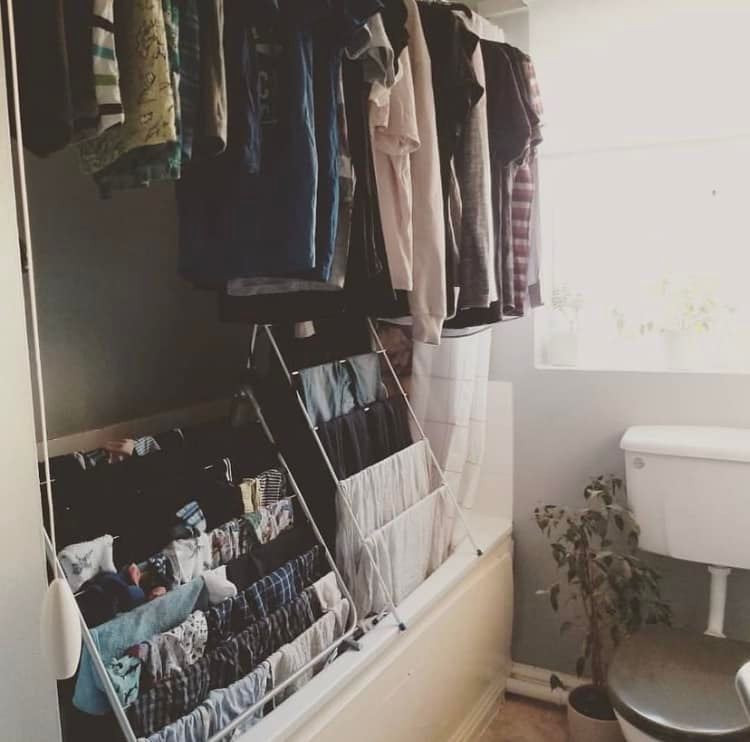 A mum has shared how she manages to dry her entire family's laundry in the bath without needing a tumble dryer