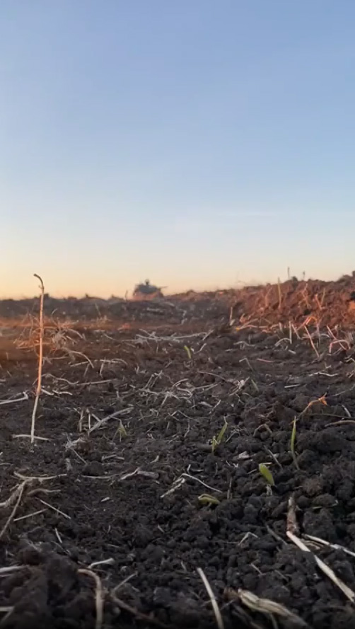 The videographer was laying low in a field while filming the tank's obliteration