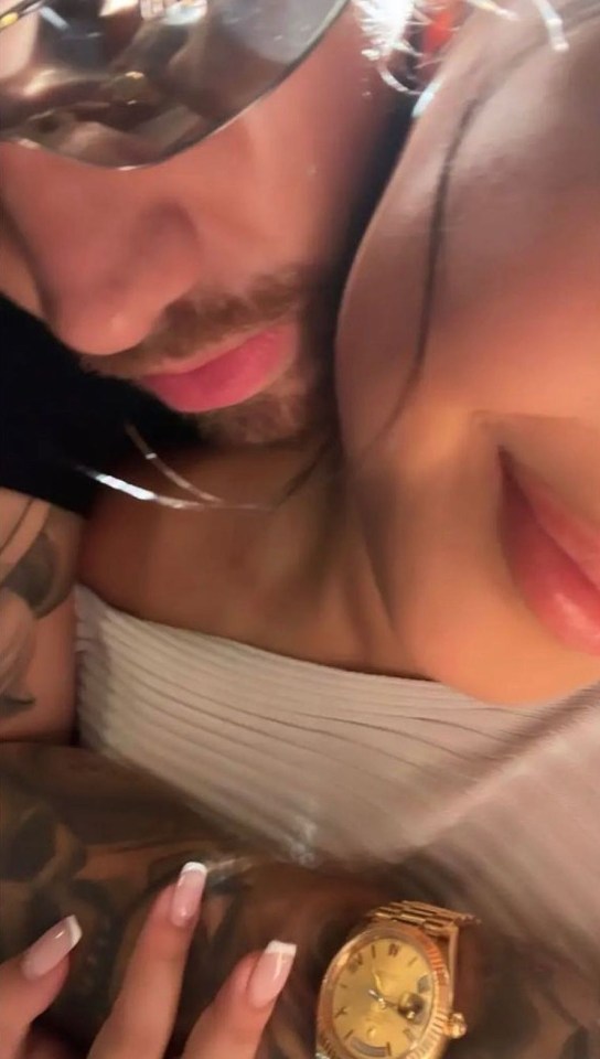 Photos of the singer with his arms wrapped around a mystery brunette emerged
